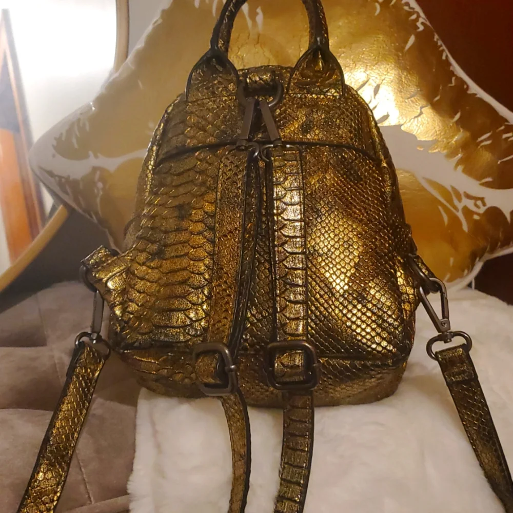 BCBG Paris Gold Snake Print Mini Backpack